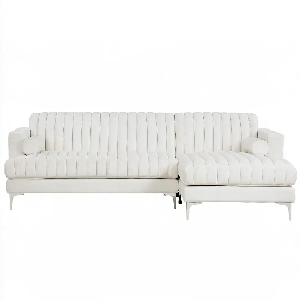 White upholstered sofa with channel-tufted backrest and armrests, showcasing a modern and stylish design by Best Seller Centerpiecepoint.